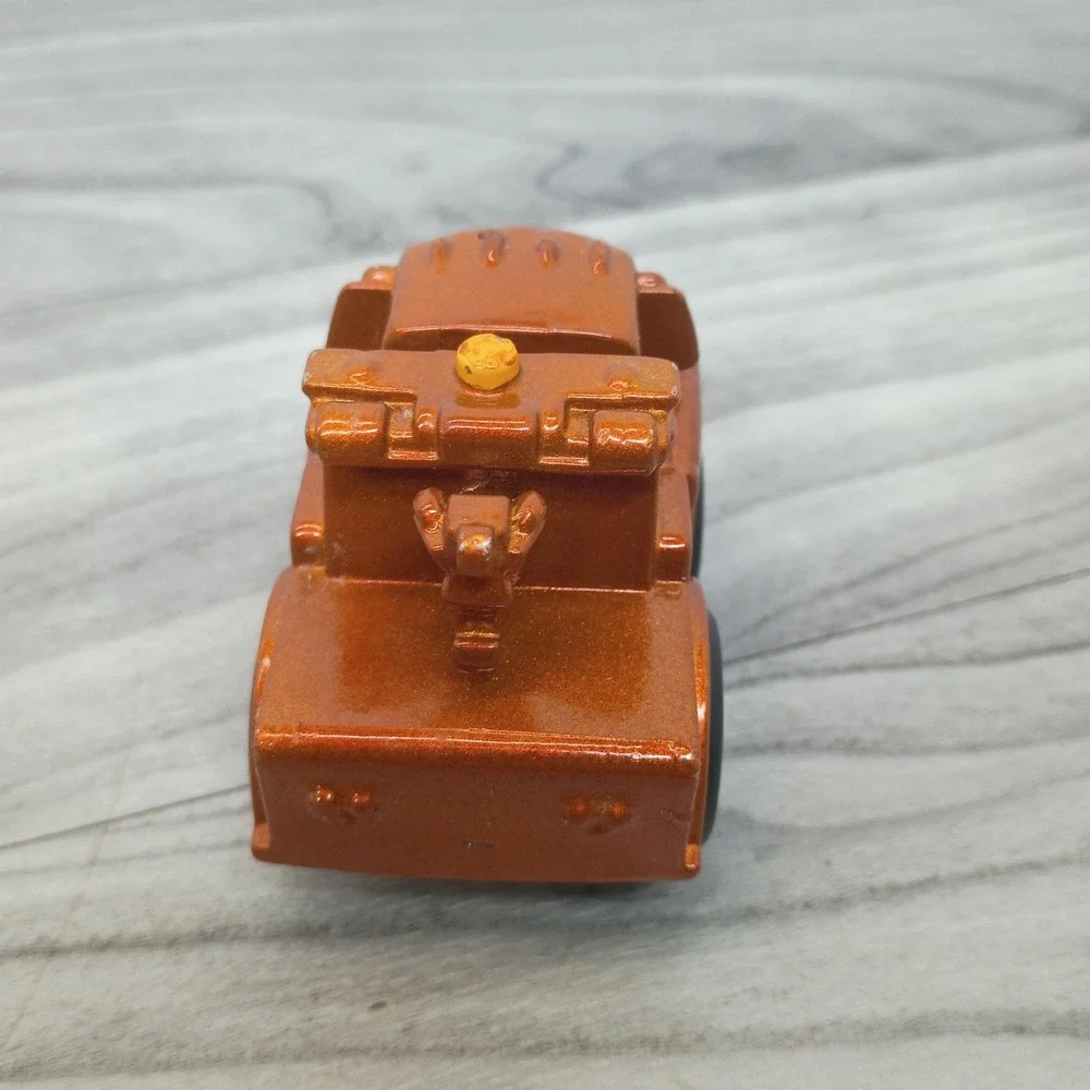 Rare 2011 Disney Pixar Cars Metallic Tow Mater Wheelies Figure FisherPrice Shiny